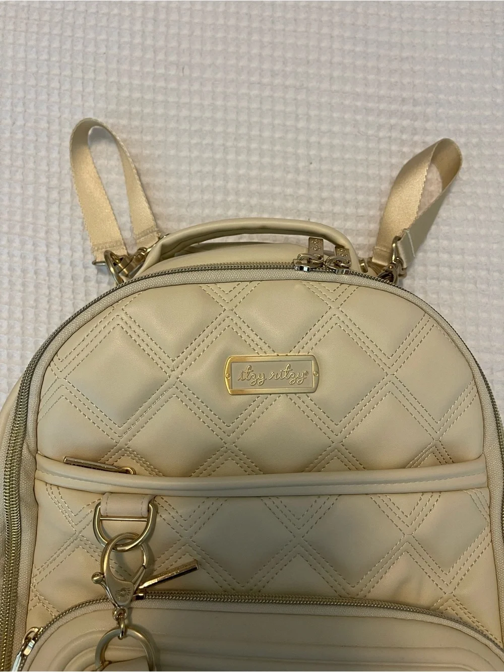 Itzy Ritzy Cream Diaper Bag Backpack + Changing Pad & Dust Bag